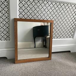 A vintage oak framed mirror. There is some ageing to the mirror but it adds character and doesn't affect use.
Measurements:- 46cm wide and 51cm tall.