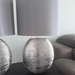 Pair of silver / grey coloured Next touch lamps.

Perfect condition.

Approx 45.5cm in height from bottom of base to top of shade. Shade diameter is 26cm approx.

Collection only.