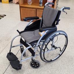 like new karma wheelchair, self propelled or handles for pushing. seat width 16 seat depth 17.
