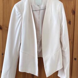 Cream blazer which can be worn with anything. Size uk 12