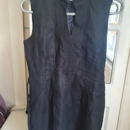 Lovely Linen Dress fully lined in silk. 
Front Darts  plated belt 2 slits with delicate trimings on the arm holes and  slits . with side zip for a perfect fit. New never been worn.