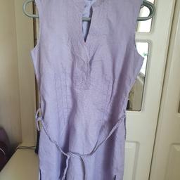 Beautiful Linen Dress Fully  Lined in satin never been worn. Beautiful Lilac colour with front darts plated belt ,side slits ,delicate trimings.Side zip for a perfect fit.