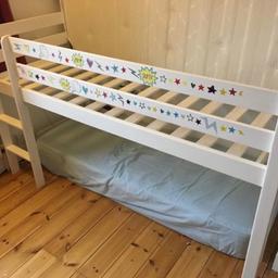 Painted white. Stickers you can see in picture all removed. Condition is good, used. Mattresses not included. We put a mattress on floor underneath to make it into a kind of low height bunk bed. Or space can be used as cosy play space or for storage. Disassembled ready to transport.