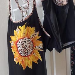 sunflower tankini would say large fit.size 16.18 ordered wrong size off ebay says xl collect.s5