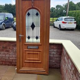 upvc front door in light oak on the face side and white internal. 70mm profile 890mm wide x 2110 height (without cill ) in good condition hinges to the right hand side as you look at it . buyer to collect and cash only £50