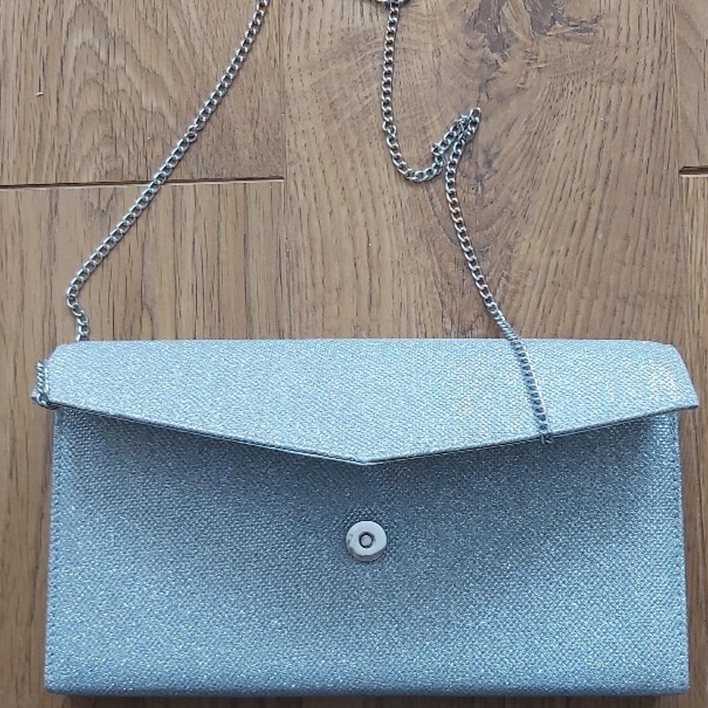 Roland cartier hot sale silver bag