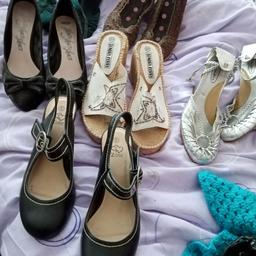 Lots of ladies shoes size 5 and 6. Have been in the loft so a bit dusty. There are wedges, heels etc. All 50p a pair.