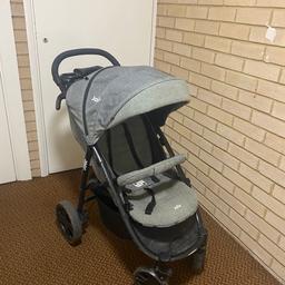 Grey Joie Pram. Hood extends fully, with basket and tray bar for drinks and snacks. Folds away with one hand pull for quick storage. 

Please check picture for imperfections

Fully functional, collection only please SE19