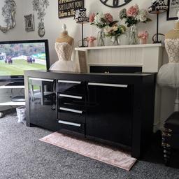 lovely long black gloss sideboard. it's very very heavy will need 2 people to collect it. couple minor faults as shown in pictures easy fix. and nothing major. pick up Newton Aycliffe. (((( it's free))))