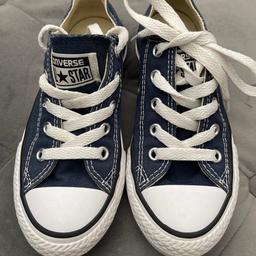 Navy blue Converse trainers 
Worn twice so in excellent condition 
Size 11 Junior