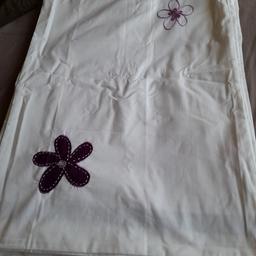 10 pieces of brand new pillow cases, white with purple embroidery. Pick up only please thanks