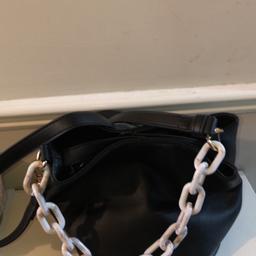 Three small handbags all new never been used two with plastic chain handles and detachable shoulder strap the other just a Pearl beaded handle from Oasis