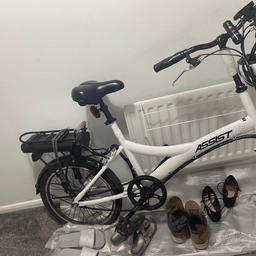 Assist Hybrid Electric Bike - 20" Wheel
Original price £599
Black & white
Selling with matching helmet
Battery & charger included

Only used for couple of months!
1 flat tyre and new break shoe need hence the reduced price

Collection only
Rm13