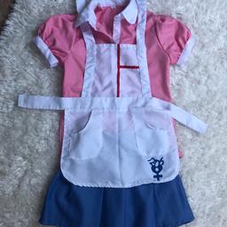 Danganronpa Mikan Tsumiki Cosplay. It’s medium in Asian sizing. Can fit 6-10ish mainly 6-8 UK. Has an little spill of paint and missing very top button not that noticeable but can be sewed back on.