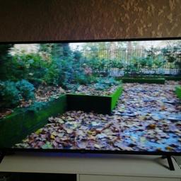 55 inch LG smart TV for sale selling caise getting bigger TV comes with LG wond as well