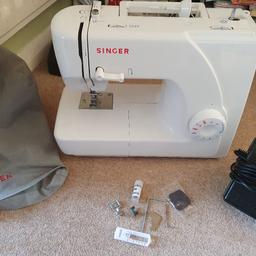 singer sewing machine in perfect working order, comes with cover and accessories collection only