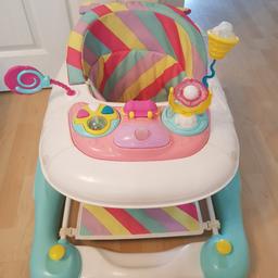 Very much loved and looked after walker rocker. Excellent used condition. Washable cover. Will be fully cleaned before collection. Includes battries. Can be used from 6 to 24 months, plays different music and 3 level positions.