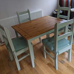 Free. Solid wood table and four chairs. Must collect.