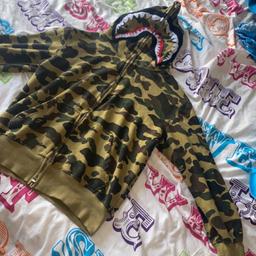 A Bathing Ape (BAPE) 1st Gen Zip Shark Hoodie -Green Camo - Size Small - Condition is "Used".