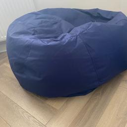 Navy extra large bean bag. Very good condition from the beanbag company.