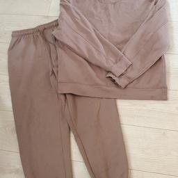 joggers are a M and jumper a L. in good condition