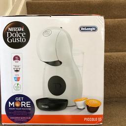Delonghi coffee machine in white. Brand new in box. Never used or opened.