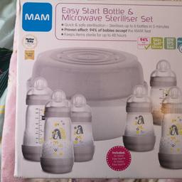 The MAM Easy Start Bottle and Microwave Steriliser Set is quick and easy to use, with 6 bottles included.

Up to 6 MAM bottles fit across the 2 basket levels. Simply add water to the 200ml mark, pop on the easy drain lid and microwave for 5 minutes to clean your feeding equipment. The MAM Easy Start Bottle and Microwave Steriliser stores bottles hygienically for up to 48 hours.

The set includes 3x 160ml and 3x 260ml Easy Start anti-colic self- sterilising bottles. The anti-colic design allows a