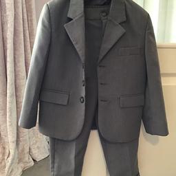 grey wedding suit by Gorgeous Collection age 5.
Complete with jacket and trousers 
Little pocket for a hanky to go in
3 little buttons  
Button fastening and zip for the trousers with elasticated area at the back.