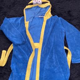 Gown 12-13 years 
Minions 
Selling as too small 
Belt pockets 
Really good condition