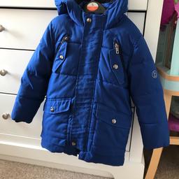 Boys baker by ted baker coat 
Blue colour 
Very warm winter coat, fur unlined 
Perfect condition 
Age 5-6