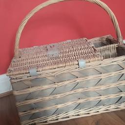 The picnic basket is brand new, bought and £100 and never used. 4 Forks, 4 spoons , 4 knives, cloths, corkscrew, glass cups, 1 boxes of plates and little tubs for salt and pepper all included, packaged and untouched in secured, strapped areas.