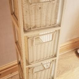 White, wooden unit (could do with a wipe down and fresh coat of paint.)
Has 4 useful storage drawers I used for bits and bobs in my hallway to put letter and keys and Tools. 

First to collect. No holding. Or can deliver for a small fee if local.