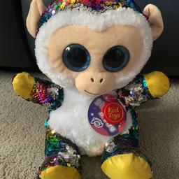 brand new soft toy
reversible sequins either rainbow or silver
brand new with tags
25 cm tall
please look at other items listed