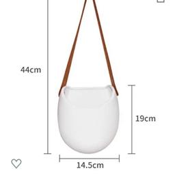 These lovely white ceramic white plant 🍀 holder with Brown Leather strap 
BNIB