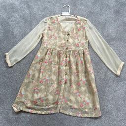 Girls Frock style dress in champagne gold with full floral embroidery work on front of kameez. Comes with co-ordinated pyjama. Dress size Age 8-9. Bottoms Age 6-7. Worn once for Eid. Daughter has outgrown. £15.00 fixed price.