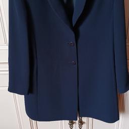 Lovely and smart jacket size 12. chest 35", Petite fit, 60% Viscose,100% 40% Polyester, 100% polyester lining. The Colour is DARK NAVY BLUE!!!!