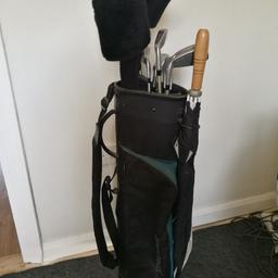 Spalding ladies golf set. What's included:
1, 3 and 5 woods (including head covers) 
4 - 9 irons
Pitching and sand wedge
Golf bag
Umbrella
Unused ladies small left hand glove
2 golf towels
35 golf balls
Score card holder
3 tees
Ball marker 

No putter is included.

These are well used but still absolutely functional.