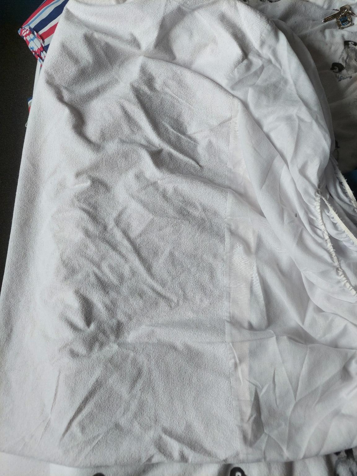 2 Dunelm single waterproof mattress protector in BD22 Bradford for £18.