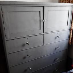 Old chest of drawers .sz 5fthigh x6ft length x2ftwide 2 cupboards at the top with 2 smaller  drawers  underneath  and 3 larger drawers  below.plenty of storage space .been upcycled. suit large room  / Mancave etc.buyer collect.
