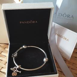Pandora bracelet with charms all in excellent condition