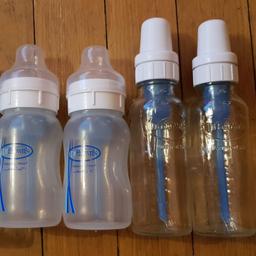 Here I am selling 2 glass Dr Brown bottles, 2 plastic Dr Brown bottles and 1 Mam bottle.