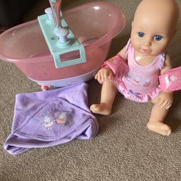 Baby Annabell learns to swim with movement and sound. Comes with her swimming costume, arm bands , towel and original box.
Baby borne bath with lights, music, foamer and shower sprinkler.

Both in excellent condition.
