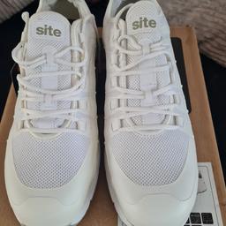 Brand new white safety shoe.
