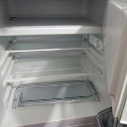 Small fridge with freezer box. In excellent condition. Has few dents on the side