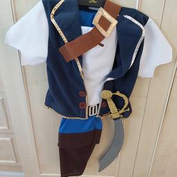 Size 7-8yrs Jake from the Neverland Pirates costume. Includes plastic sword, top and pants. From a smoke and pet free home.