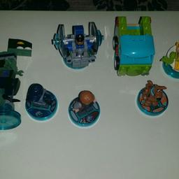 sold as seen 
all working
 all discs present
lego dimensions
jurassic world
Owen, acu worker, the dome and blue the raptor.
scooby doo
Shaggy , scooby , the van (missing 1  roof piece) and Sandwich
collect hammersmith
I can post £4.50