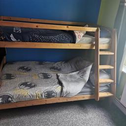 Wooden bunk beds with mattresses (if wanted - few stains on mattress). One wooden slat missing from top bunk (shown in zoomed in picture) doesn't effect the use of the bed at all. Single on the top, small double on the bottom
Needs gone ASAP

From a smoke and pet free home.