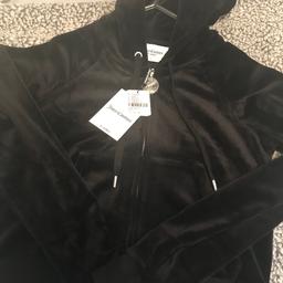 Bran new juicy couture hoody with tags £75 on tag 
Will take £30
Size Small