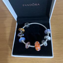 Pandora Bracelet including morano glass charms ,
I’m great condition. Bracelet new only worn a few times , charms some are retired .
