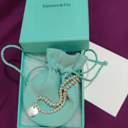 I'm selling a Tiffany & Co bracelet bought by my son. It says "I love you".

it's not the type of jewellery I'd usually wear. The money will go towards my new coffee table instead. This cost my silly son a few hundred and so it's listed at a real bargain 😊